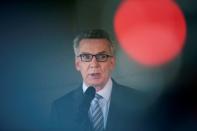 German Interior Minister Thomas de Maiziere speaks to the media after a vistit at the Facebook office in Berlin, Germany August 29, 2016. REUTERS/Stefanie Loos