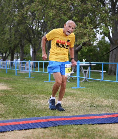 Melbourne Beach runner Bob Sielski crosses the finish line of the Anchorage Mayor’s Marathon in June in Alaska.