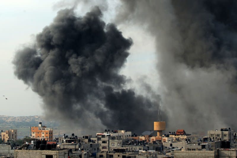 Smoke billows after an Israeli strike over Rafah in the southern Gaza Strip on Wednesday. Photo by Ismael Mohamad/UPI