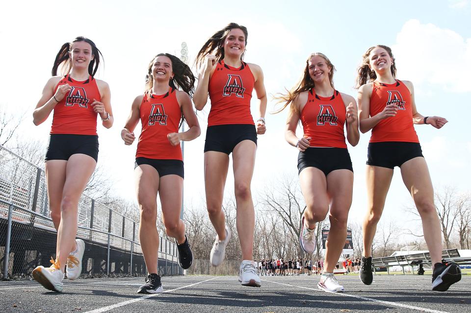 Ames High senior girls track team runners (from left) Eliana Deardorff, Ellie Lynch, Ali Frandsen, Ireland Buss and Cameron Moon hope to lead the Little Cyclones to their second Drake Cup in three years at the Drake Relays held April 26-29 at Drake Stadium in Des Moines.