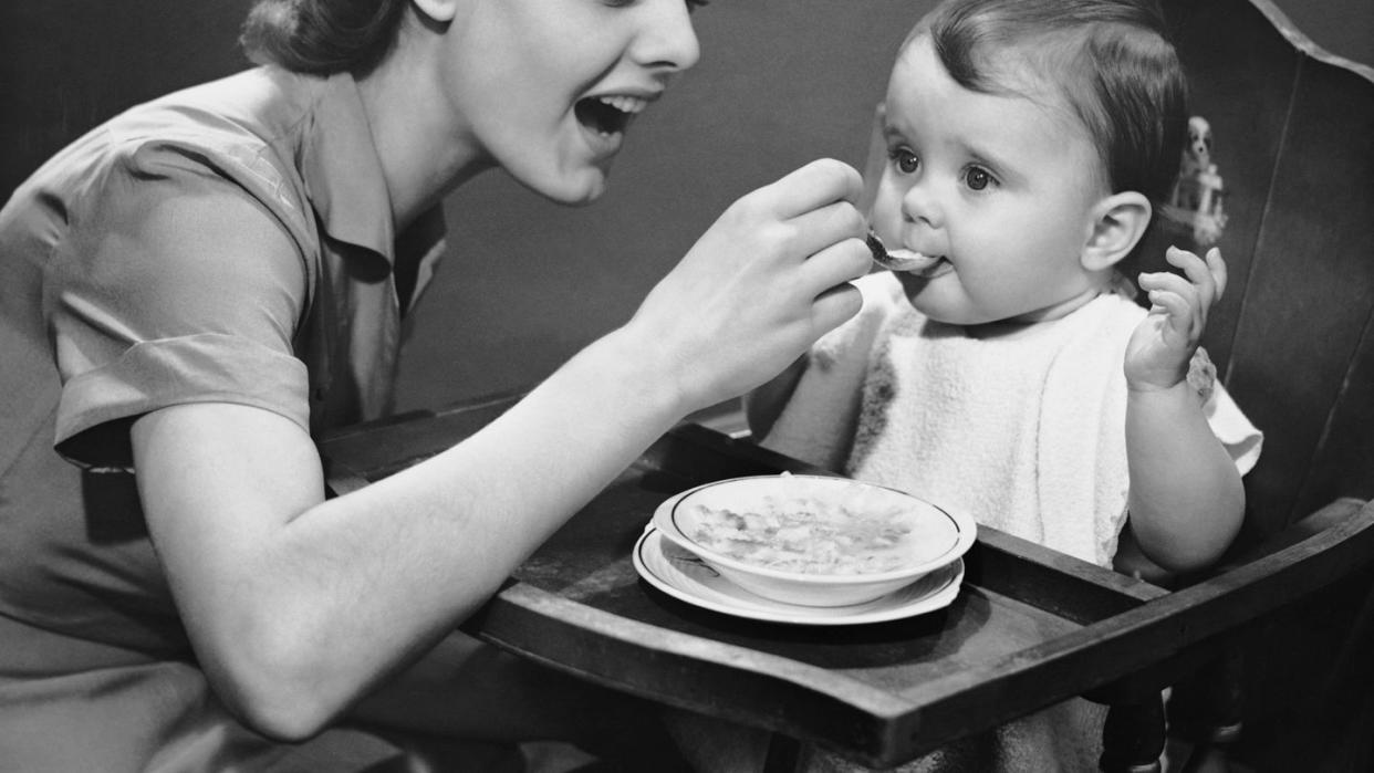 mother feeding baby