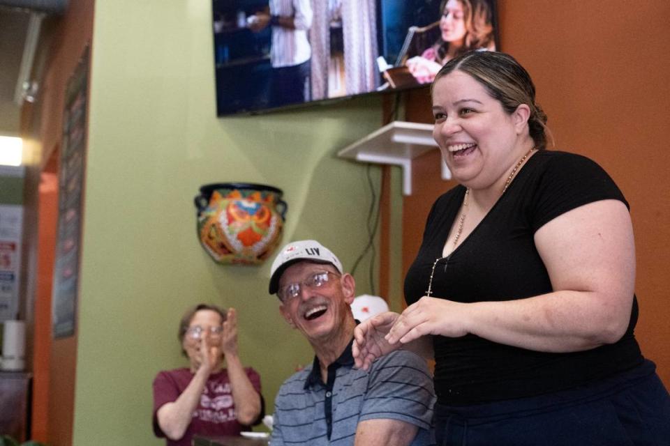 Perla Garcia, the owner of Tarahumaras Mexican Food, laughs as she chats with KCK Taco Trail Tour visitors Wednesday at the restaurant’s second location in Kansas City, Kansas.