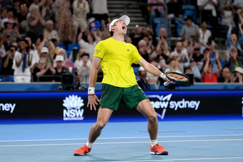 Australian tennis player Alex De Minaur celebrates defeating Germany's Alexander Zverev during their men's Semi-Final tennis match of the 2024 United Cup at Ken Rosewall Arena in Sydney. Steven Markham/AAP/dpa