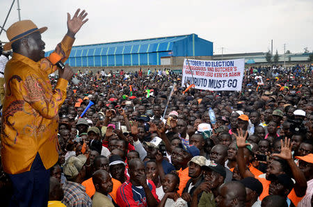 Kenyan opposition leader Raila Odinga, the presidential candidate of the National Super Alliance (NASA) coalition, addresses supporters during a rally to celebrate the country's Mashujaa Day (Heroes Day) celebrations in Kisumu, Kenya, October 20, 2017. REUTERS/James Keyi