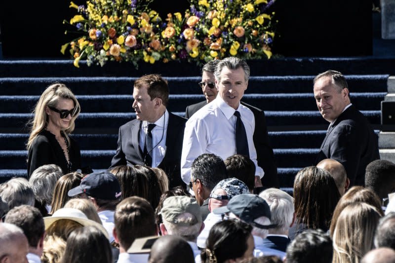 California Governor Gavin Newsom (C) talks with guests before the funeral of Sen. Diane Feinstein In San Francisco on Thursday, October 5, 2023. Authorities closed the Civic Center to the public as services were held for the Senator and former mayor of the city. Photo by Terry Schmitt/UPI