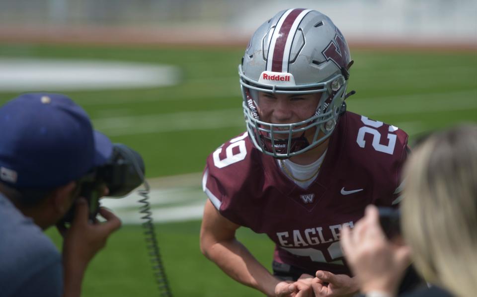 A Wellington High School football player poses for a portrait at the Coloradoan's high school football media day at the new Timnath High School on Tuesday, Aug. 2, 2022.