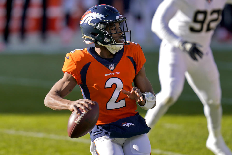 Denver Broncos quarterback Kendall Hinton (2) looks to throw against the New Orleans Saints during the first half of an NFL football game, Sunday, Nov. 29, 2020, in Denver. (AP Photo/David Zalubowski)