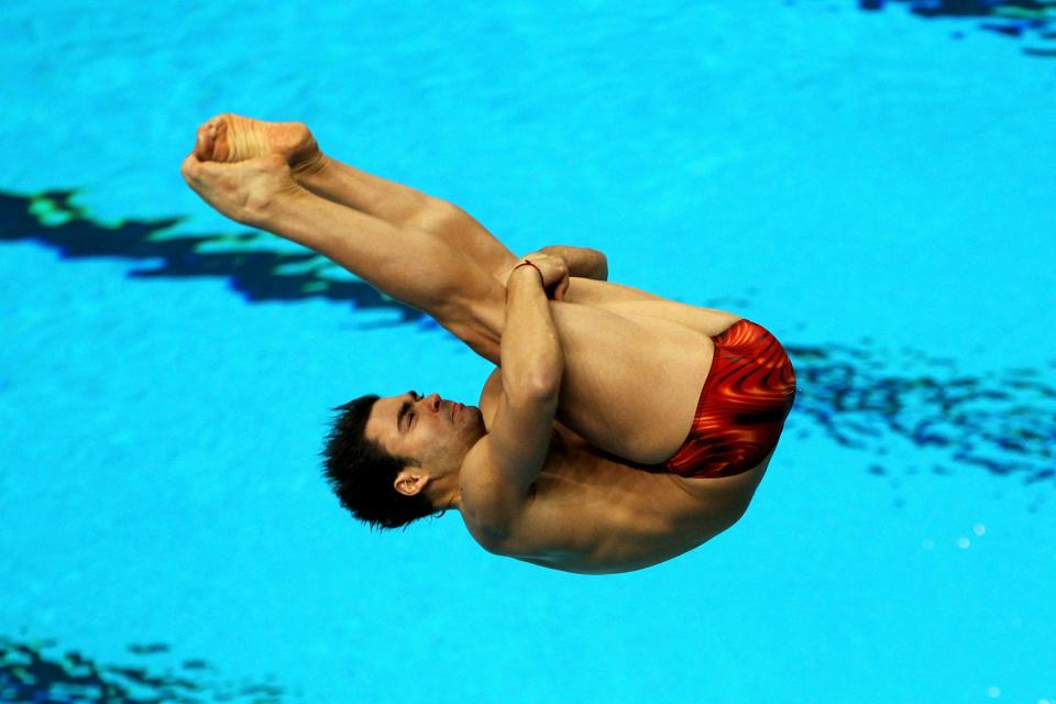 DELHI, INDIA - OCTOBER 11: Alexandre Despatie of Canada competes in the Men's 3m Springboard Preliminary at Dr. S.P. Mukherjee Aquatics Complex during day eight of the Delhi 2010 Commonwealth Games on October 11, 2010 in Delhi, India. (Photo by Phil Walter/Getty Images)