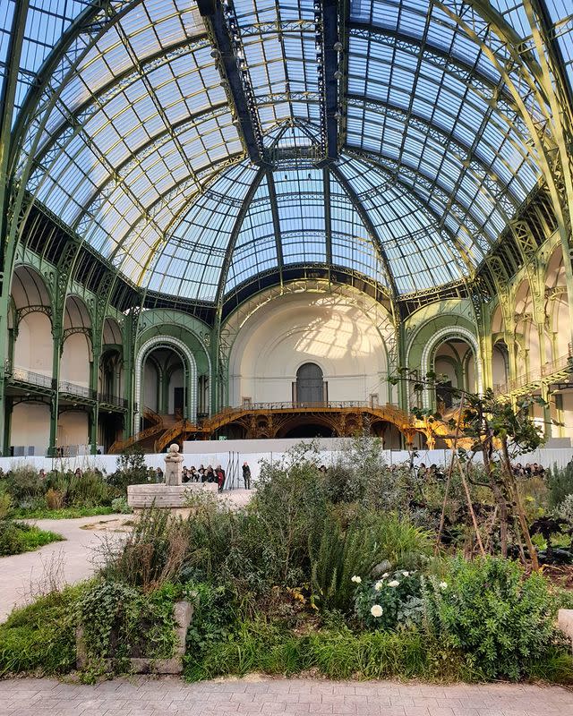 <p>Creative Director Virginie Viard transformed the Grand Palais into a garden inspired by the garden of the Cistercian monastery in Aubazine named Aubazine Abbey. </p><p><a href="https://www.instagram.com/p/B7k4ooCCqKf/" rel="nofollow noopener" target="_blank" data-ylk="slk:See the original post on Instagram;elm:context_link;itc:0;sec:content-canvas" class="link ">See the original post on Instagram</a></p>