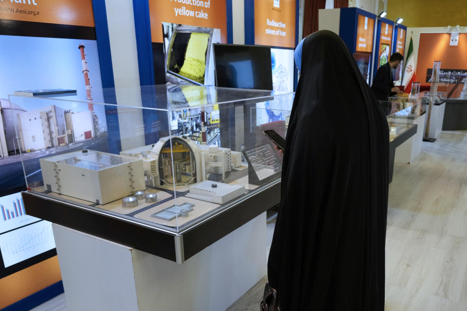 A participant of Iran's "International Conference on Nuclear Science and Technology" visits an exhibition of the country's nuclear achievements in the central city of Isfahan, Iran, Monday, May 6, 2024. (AP Photo/Vahid Salemi)