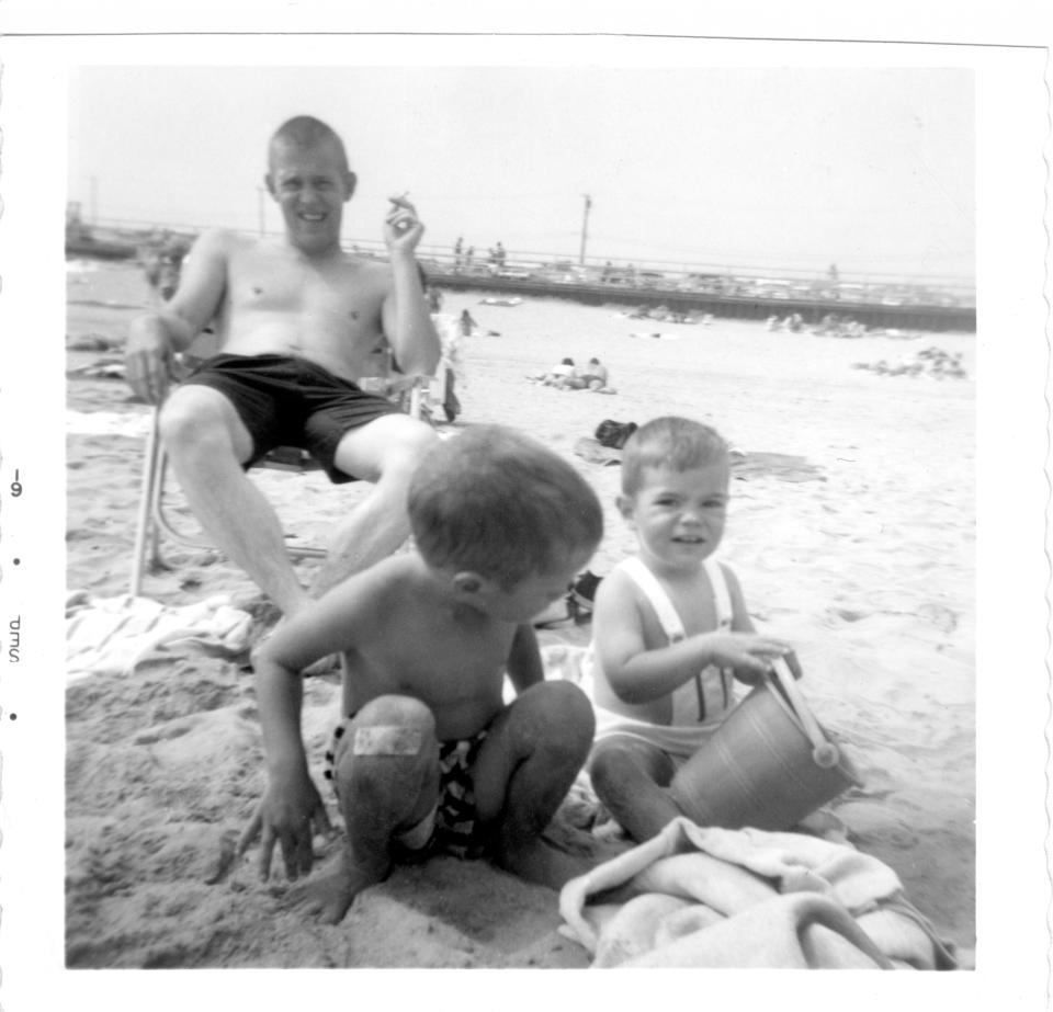 John Walsh, right, with his father, Donald Walsh, and his brother Rob at Scarborough Beach in 1961.