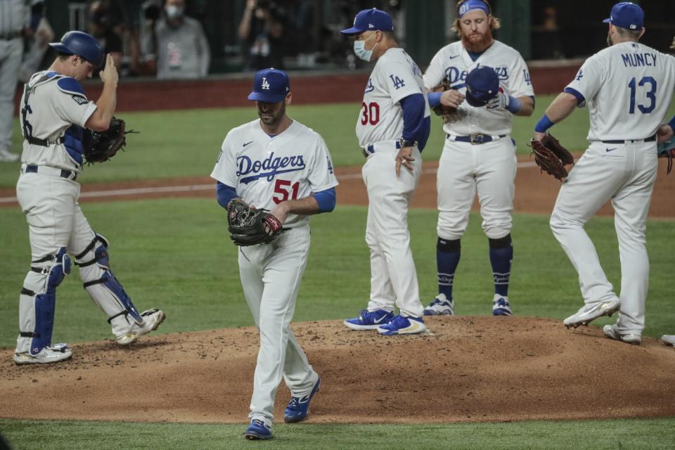 Dodgers relief pitcher Dylan Floro exits the game in the third inning.