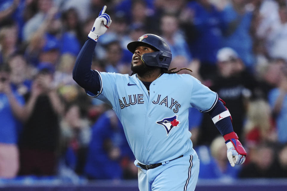 FILE - Toronto Blue Jays' Vladimir Guerrero Jr. celebrates his two-run home run against the Texas Rangers during the first inning of a baseball game Thursday, Sept. 14, 2023, in Toronto. Juan Soto, Vladimir Guerrero Jr. and Pete Alonso are among 194 players across Major League Baseball still negotiating salaries for the 2024 season leading into Thursday’s Jan. 11, 2024, deadline. (Nathan Denette/The Canadian Press via AP, File)