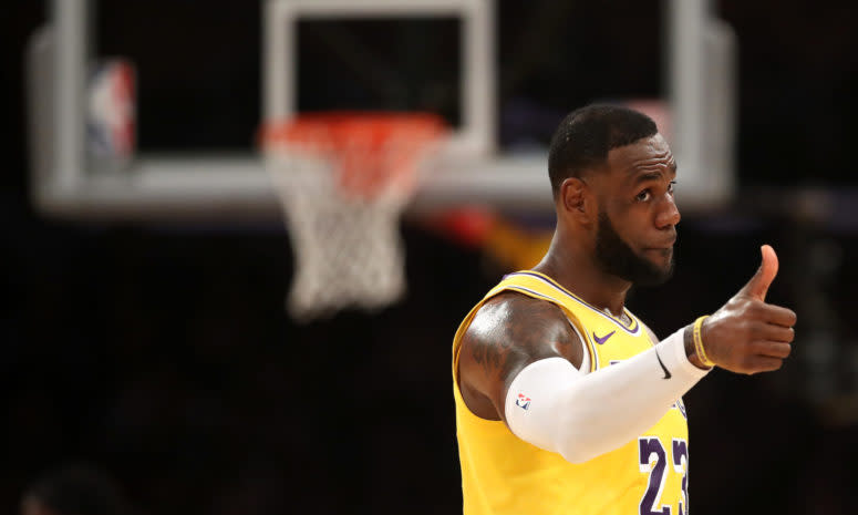 LeBron James giving a thumbs up during a game.