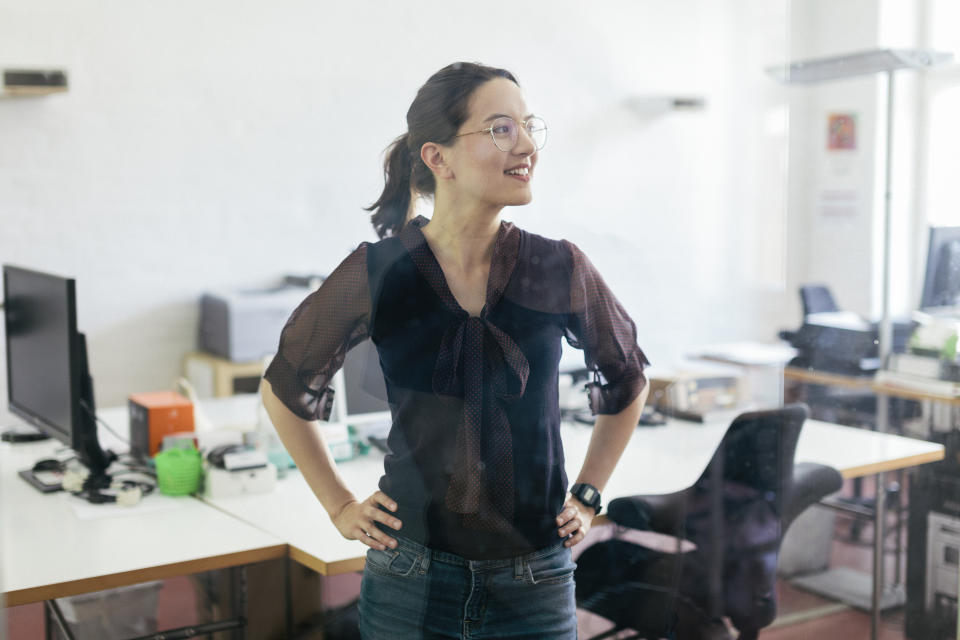 Portrait of a startup business office worker smiling.