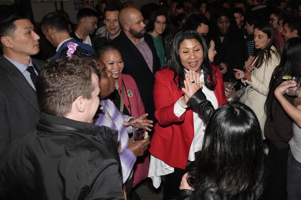 San Francisco Mayor London Breed talks to supporters during an election night party.