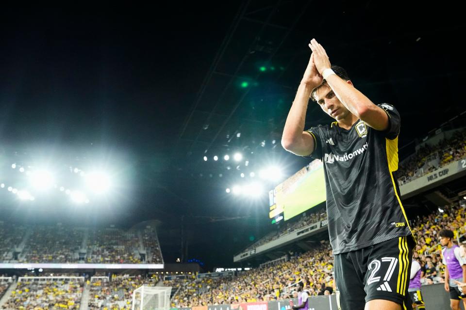 Crew forward Max Arftsen applauds fans as he leaves the field during against Charlotte FC on July 17.