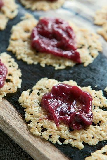 <p>Fruit chutney is a popular accompaniment to serve with cheese plates, but in this creative twist, the cheese is transformed into crispy crackers and topped with a sweet, spiced rhubarb-and-cherry chutney.</p><p>Get the <a href="https://www.delish.com/uk/cooking/recipes/a30266579/pecorino-crisps-with-rhubarb-cherry-chutney/" rel="nofollow noopener" target="_blank" data-ylk="slk:Pecorino Crisps With Rhubarb Cherry Chutney;elm:context_link;itc:0;sec:content-canvas" class="link ">Pecorino Crisps With Rhubarb Cherry Chutney</a> recipe.</p>