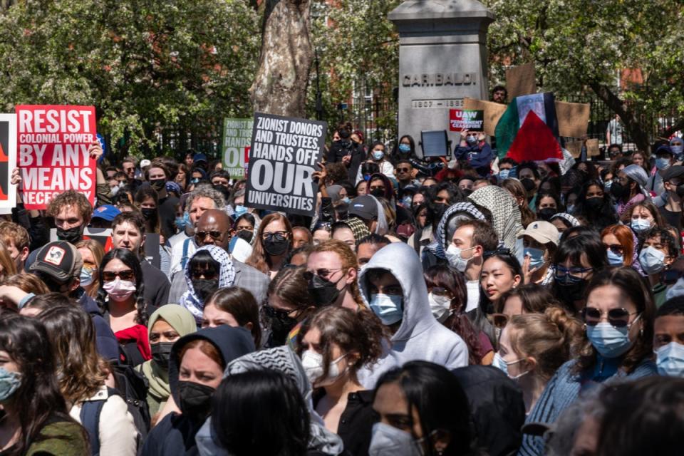 New York University (NYU) students and faculty participate in a pro-Palestinian protest at Washington Square Park on  23 April. Police arrested some 150 people the previous day (Getty Images)