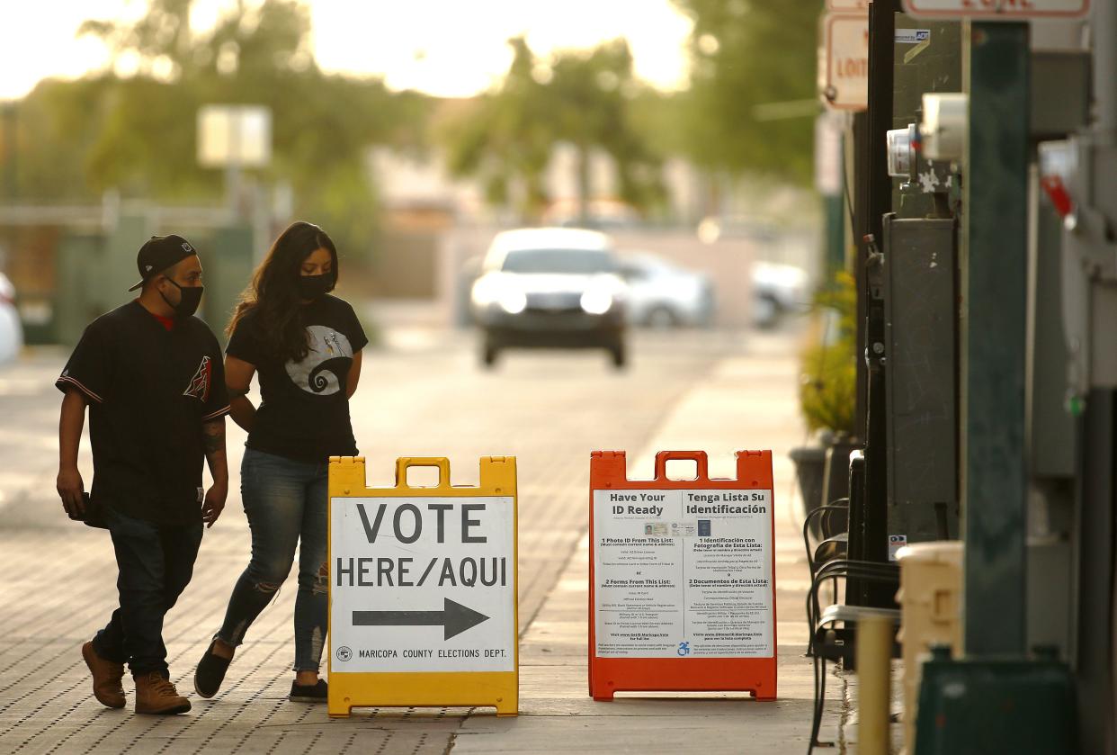 Voters arrive to cast their ballot on the last day of early voting in Mesa on Oct. 30, 2020.