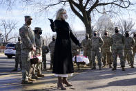 First lady Jill Biden surprises National Guard members outside the Capitol with chocolate chip cookies, Friday, Jan. 22, 2021, in Washington. (AP Photo/Jacquelyn Martin, Pool)