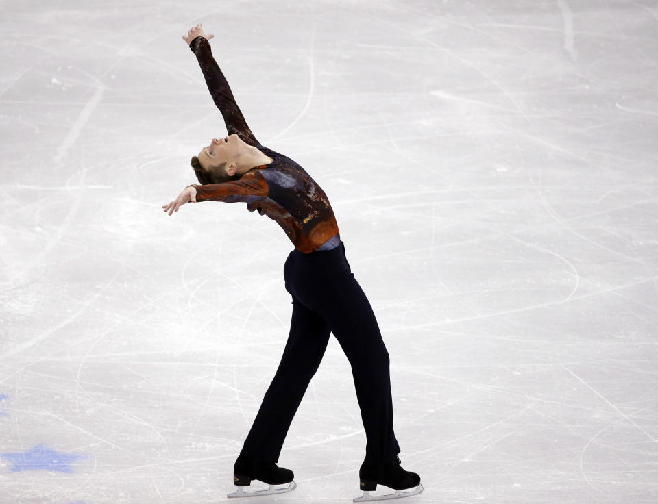 Jeremy Abbott competes in the men's free skate at the U.S. Figure Skating Championships in Boston, Sunday, Jan. 12, 2014. (AP Photo/Elise Amendola)