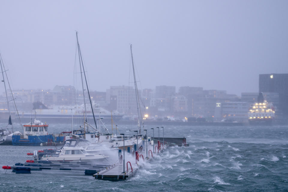 Boats in the harbour of Bodø, Northern Norway, during extreme weather, Thursday, Feb. 1, 2024. Residents of central Norway awoke to scenes of havoc and homes without power Thursday, following the country's most powerful storm in more than three decades. (Per-Inge Johnsen/NTB Scanpix via AP)