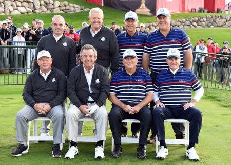 Sep 29, 2016; Chaska, MN, USA; Former Cup captains (front from left) Ian Woosman, Tony Jacklin, Lanny Wadkins, Dave Stockton, (back from left) Paul McGinley, Colin Montgomerie, Ben Crenshaw and Hal Sutton pose for a picture during a practice round for the 41st Ryder Cup at Hazeltine National Golf Club. Mandatory Credit: John David Mercer-USA TODAY Sports