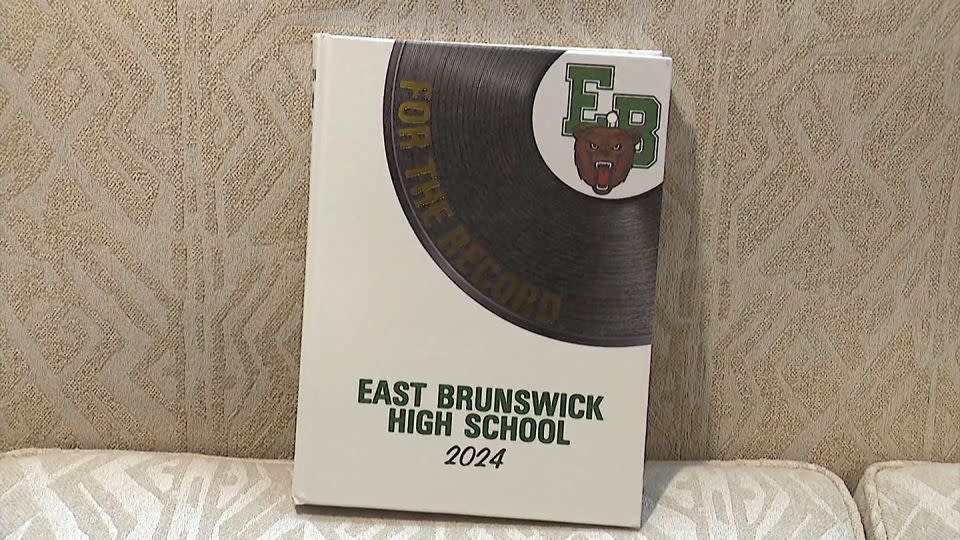 Seniors at East Brunswick High School received their yearbooks on Tuesday. - NEWS 12 NEW JERSEY LLC