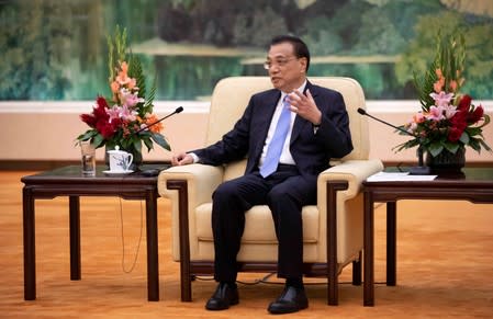 Chinese Premier Li Keqiang meets South Korean Foreign Minister Kang Kyung-wha and Japanese Foreign Minister Taro Kono in Beijing