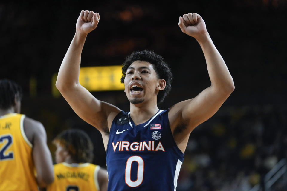 Michigan guard Dug McDaniel (0) reacts to a play against Michigan in the second half of an NCAA college basketball game in Ann Arbor, Mich., Tuesday, Nov. 29, 2022. (AP Photo/Paul Sancya)