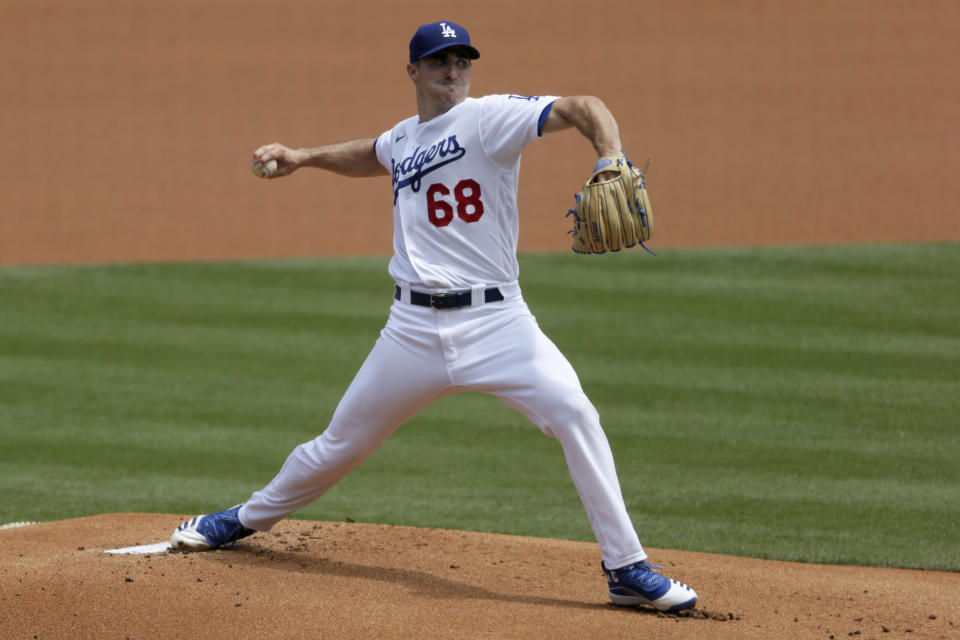 Los Angeles Dodgers starting pitcher Ross Stripling throws to the plate against the Colorado Rockies during the first inning of a baseball game in Los Angeles, Sunday, Aug. 23, 2020. (AP Photo/Alex Gallardo)