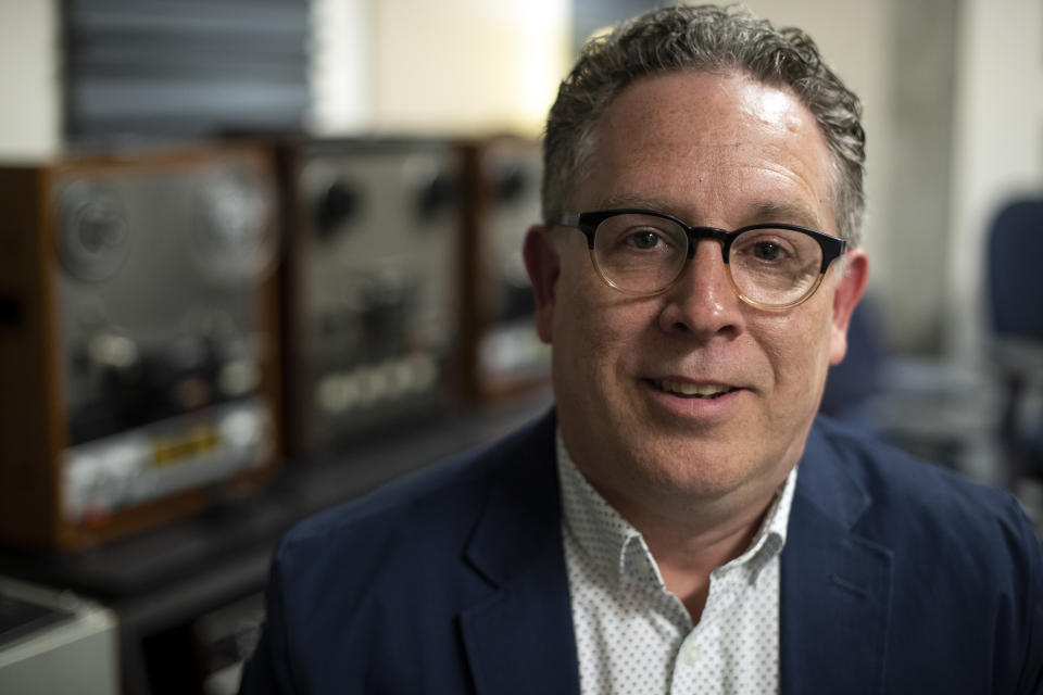 In this May 30, 2019 photo, Toby Seay, project director of the Drexel University's audio archives poses for a portrait in San Diego. A college music department has helped resurrect the music of a largely forgotten Philadelphia funk band and is hoping to discover more gems in its archives. Going through thousands of donated tapes, a band called the Nat Turner Rebellion jumped out to listeners at Drexel University. They assembled “Laugh to Keep From Crying,” the band’s debut album. It was recently released some 50 years after it was recorded at Sigma Sound, the studio which helped create the so-called “Sound of Philadelphia.” (AP Photo/Gregory Bull)