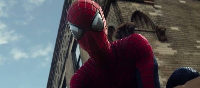 Spider-Man looking down from a rooftop in "The Amazing Spider-Man 2"