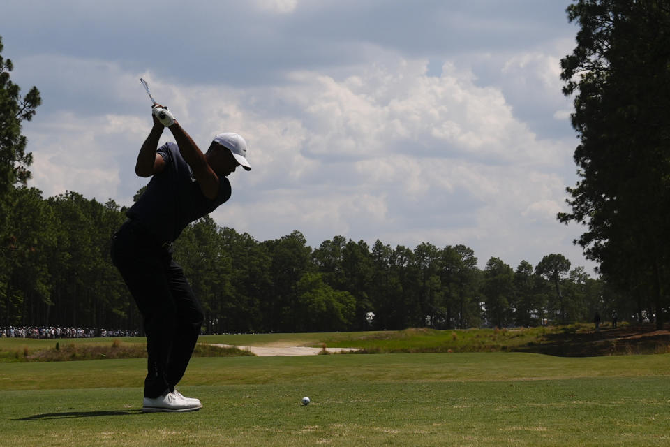 Tiger Woods hits a tee shot during the second round of the U.S. Open golf tournament Friday, June 14, 2024, in Pinehurst, N.C. (AP Photo/Frank Franklin II)