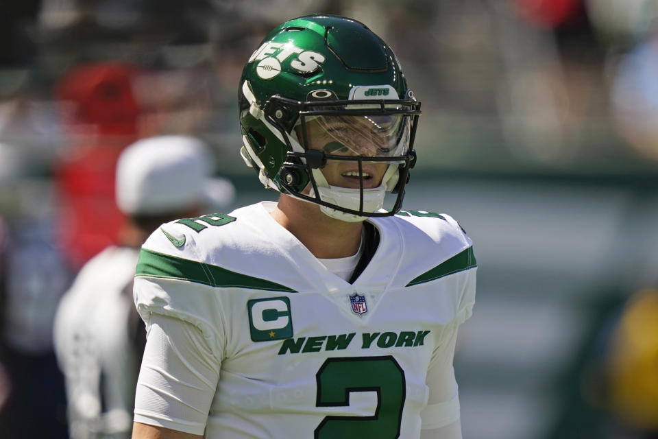 New York Jets quarterback Zach Wilson reacts after throwing an interception during the first half of an NFL football game against the New England Patriots, Sunday, Sept. 19, 2021, in East Rutherford, N.J. (AP Photo/Frank Franklin II)