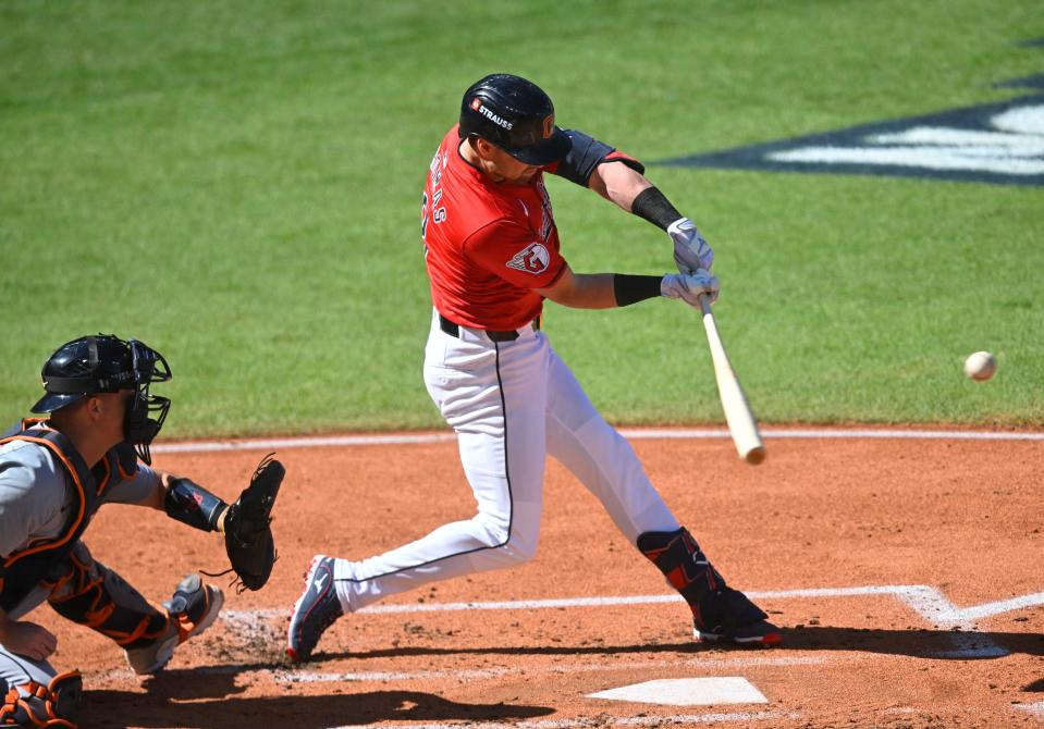 Guardians outfielder Lane Thomas (8) hits a three-run home run against the Detroit Tigers in the first inning in Game 1 of the ALDS, Oct. 5, 2024, in Cleveland.