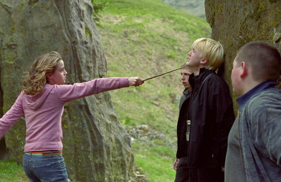 Emma Watson threatens Tom Felton in Harry Potter and the Prisoner of Azkaban (credit: Warner Brothers)