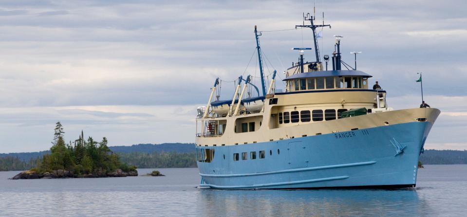 The USNPS Ranger III prepares to dock at Rock Harbor Wednesday, July 9, 2014, at Isle Royale National Park in northwestern Lake Superior. The National Park Service ship has a permanent ballast treatment system on the ship that uses filtration and UV light to prevent the spread of invasive species from the mainland to the park. The ship ferries passengers to the park, about 70 miles from its home port in Houghton, Mich.