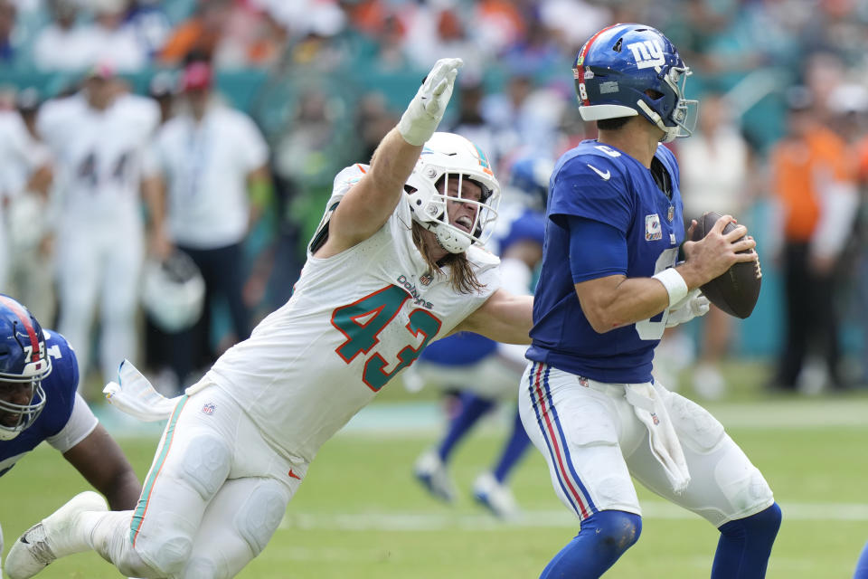 Miami Dolphins linebacker Andrew Van Ginkel (43) sacks New York Giants quarterback Daniel Jones (8) during the second half of an NFL football game, Sunday, Oct. 8, 2023, in Miami Gardens, Fla. (AP Photo/Wilfredo Lee)