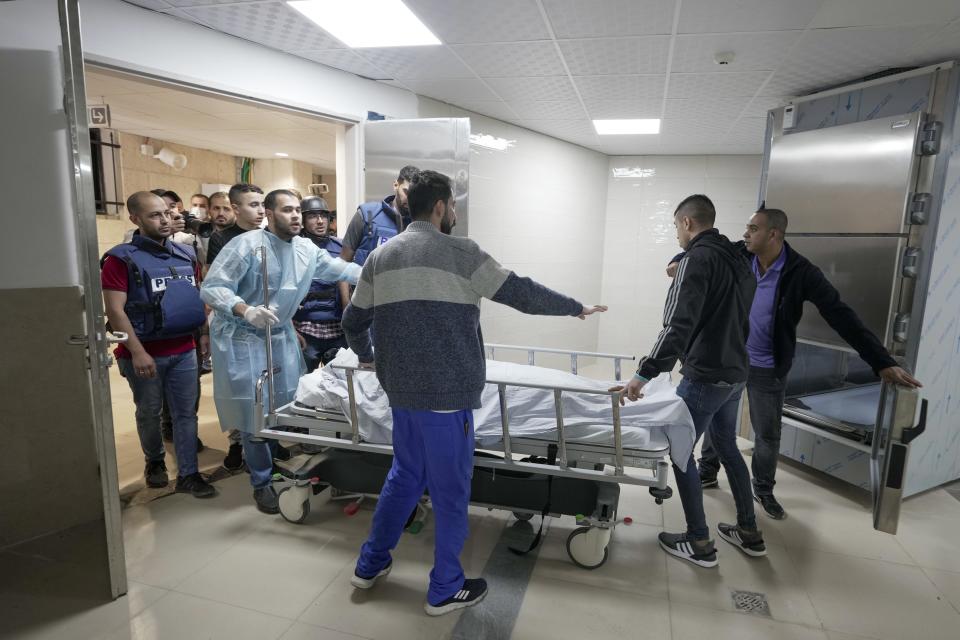  The well-known Palestinian reporter for the broadcaster's Arabic language channel was shot and killed while covering an Israeli raid in the occupied West Bank town of Jenin the Palestinian health ministry said. (Majdi Mohammed / AP)
