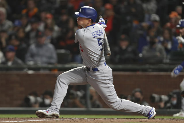 Urías hits, pitches Dodgers past Giants to even NLDS series