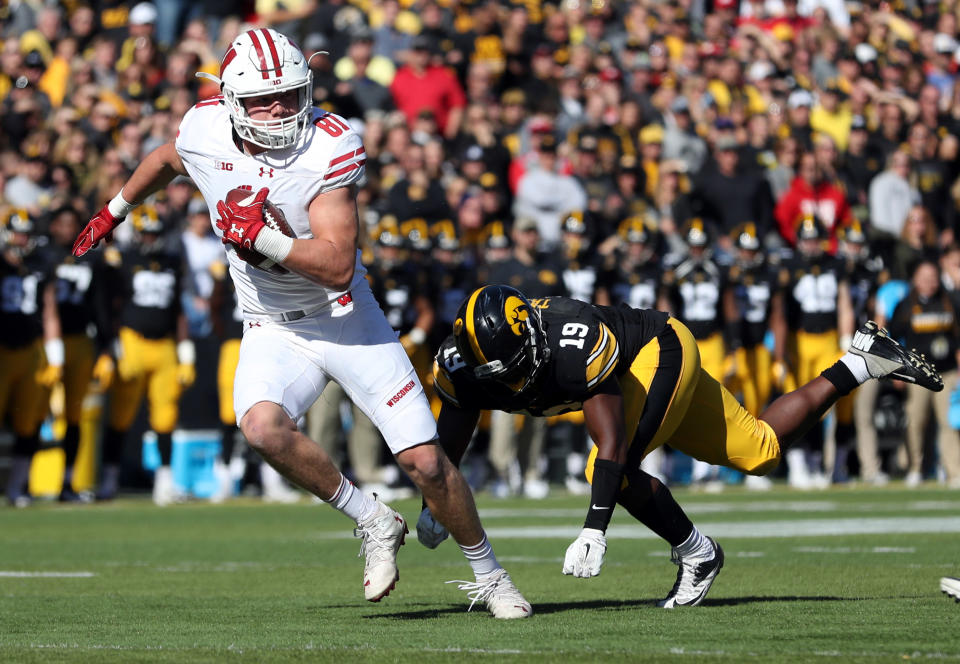 Oct 22, 2016; Iowa City, IA, USA; Iowa Hawkeyes defensive back Miles Taylor (19) misses the tackle on Wisconsin Badgers tight end Troy Fumagalli (81) at Kinnick Stadium. Mandatory Credit: Reese Strickland-USA TODAY Sports