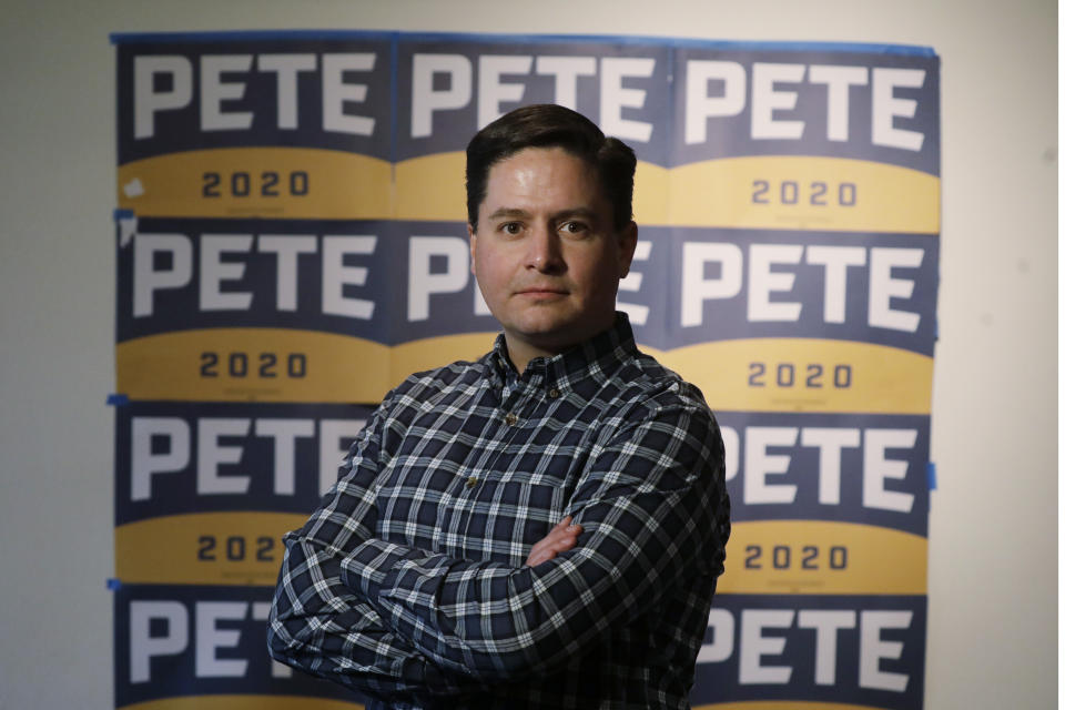 In this Tuesday, Feb. 25, 2020, photo, Taylor West poses for a photograph during a "Republicans in Utah supporting Pete Buttigieg" debate watch party in Salt Lake City. Democratic presidential candidates like to boast about their ability to lure away disaffected Republican voters. If there’s a place to test their skills, it’s Utah. Utah is “not a huge delegate win, but it represents who is a candidate that can realistically peel off some Republican or moderate or independently minded voters to build a coalition,” said West, an executive in the mountain town of Heber City. (AP Photo/Rick Bowmer)