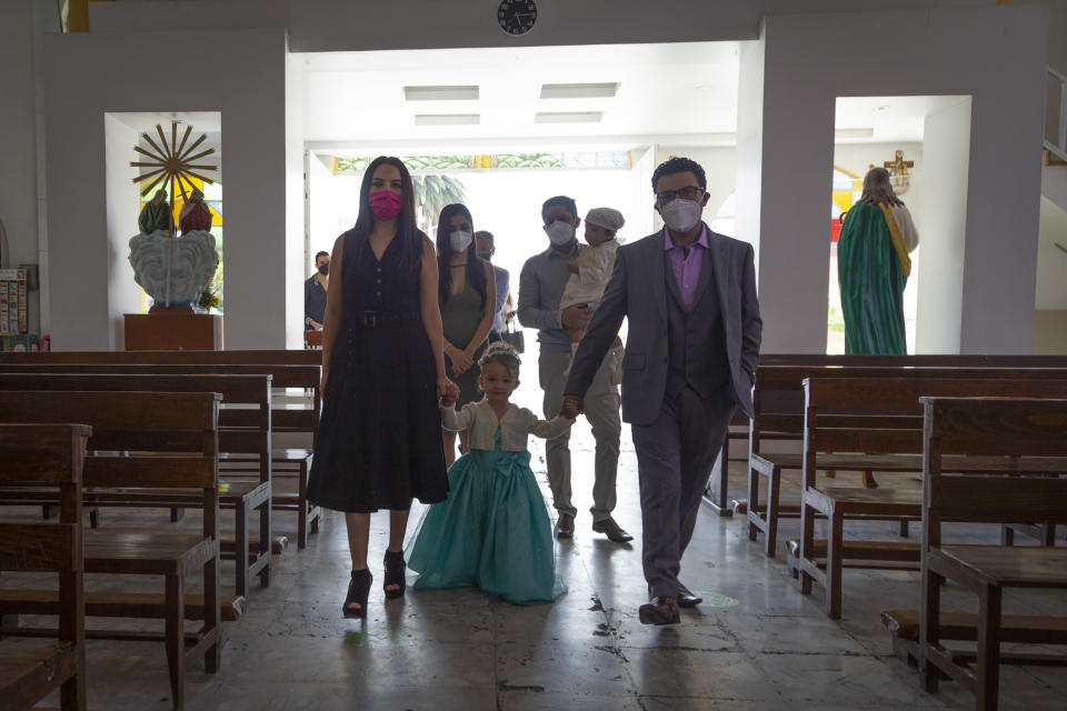 A baptism takes place at Iztapalapa municipality in Mexico City, Mexico, on August 26, 2020. Mexico has allowed the reopening of religious services despite the Covid-19 pandemic.      (Photo by Guillermo Gutiérrez/NurPhoto via Getty Images)