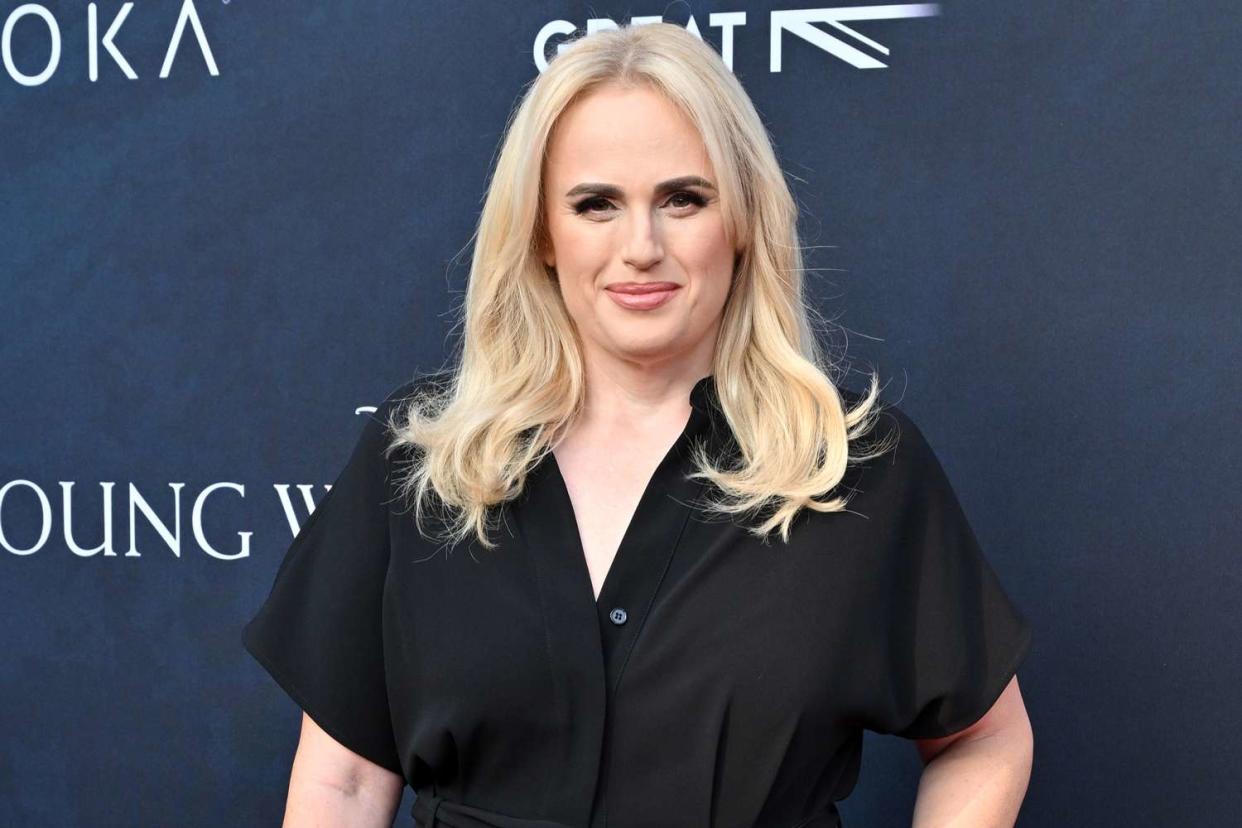 <p>Axelle/Bauer-Griffin/FilmMagic</p> Rebel Wilson says her directorial debut "could only" be a musical