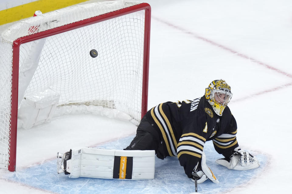 Boston Bruins goaltender Jeremy Swayman (1) deflects a score-attempt by the Vegas Golden Knights in the third period of an NHL hockey game, Thursday, Feb. 29, 2024, in Boston. (AP Photo/Steven Senne)