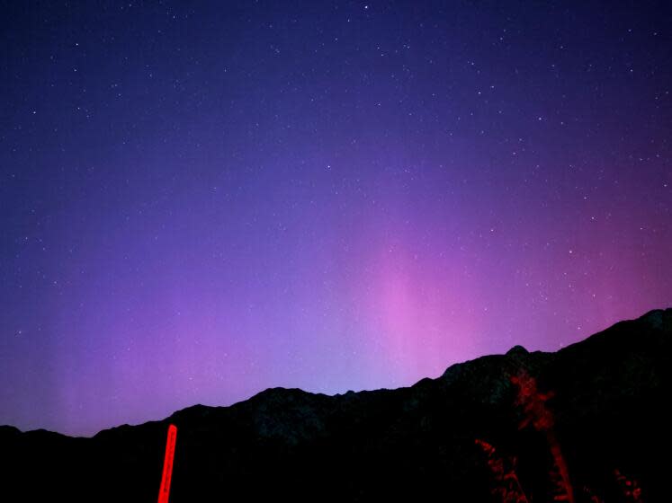 Los Angeles, California-May 10, 2024-Above the clouds and facing north, the lights from the aurora borealis were visible along Highway 2 in Angeles National Forest. (Jaclyn Cosgrove / Los Angeles Times