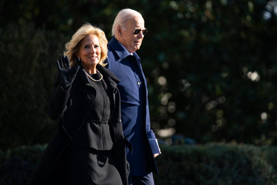 President Joe Biden and first lady Jill Biden walk to board Marine One on the South Lawn of the White House, Tuesday, Nov. 28, 2023, in Washington. The President and first lady are traveling to Georgia to attend former first lady Rosalynn Carter's tribute service. (AP Photo/Evan Vucci)