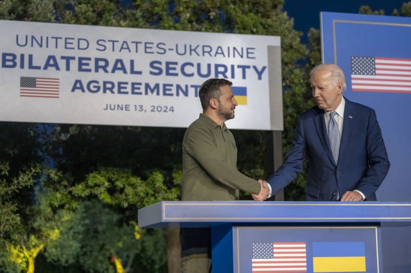 Ukrainian President Volodymyr Zelensky (L) is using the peace conference to gather support for a 10-plan he first conceived in 2022 that would see an end to hostilities between his country and Russia, after signing a 10-year bilateral security agreement with the United States earlier in the week. Photo courtesy of U.S. Embassy in Italy